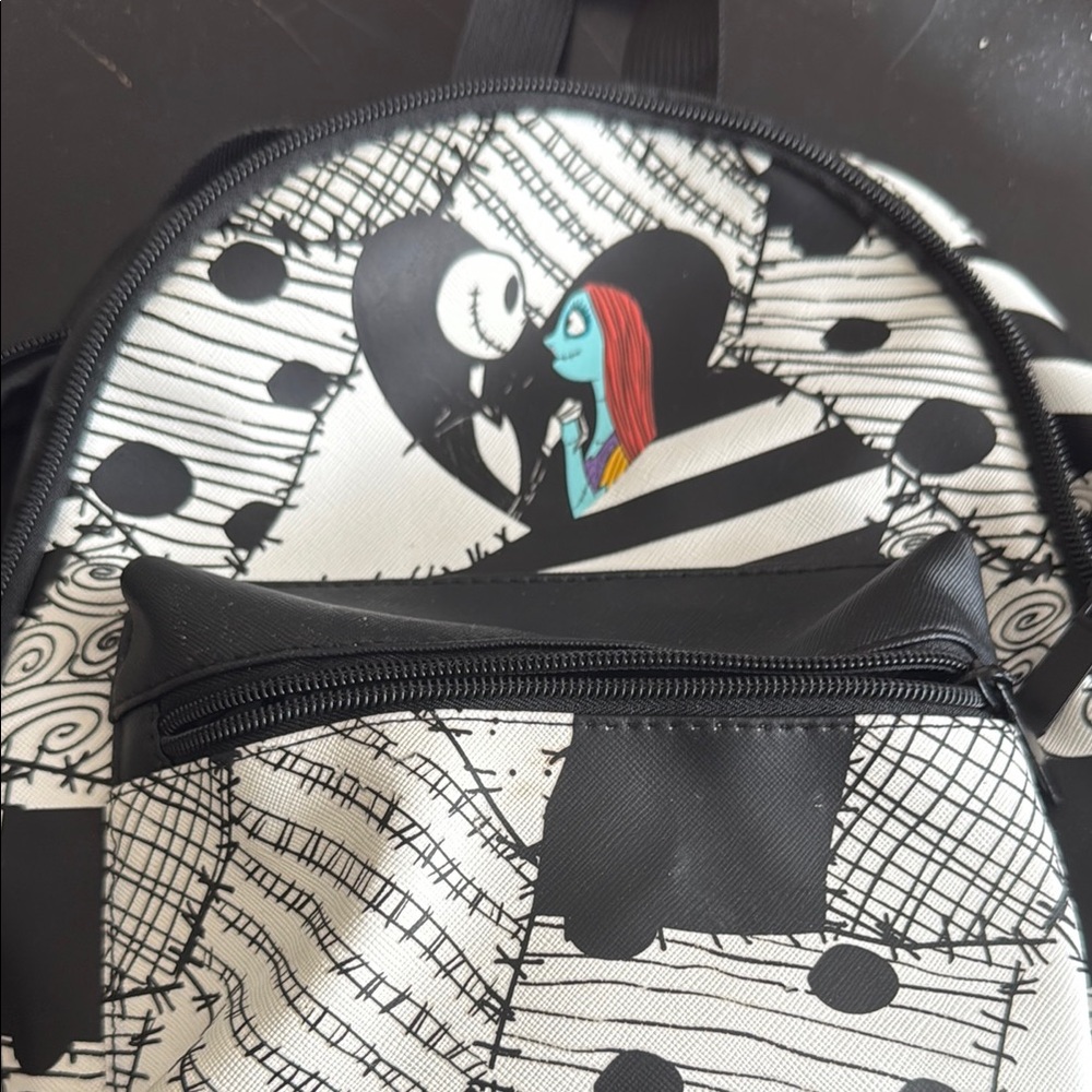 Black and White Polka Dot Backpack with Geometric Design